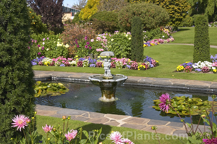 A formal garden that derives much of its colour from the abundant flowers of summer-blooming bedding plants.